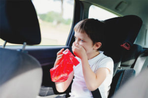 The child is rocking in the car